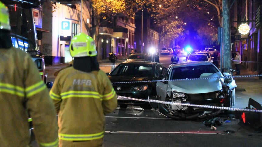 Damaged vehicles are seen at the corner of Queens Street and A'Beckett in Melbourne CBD, June 26, 2018.