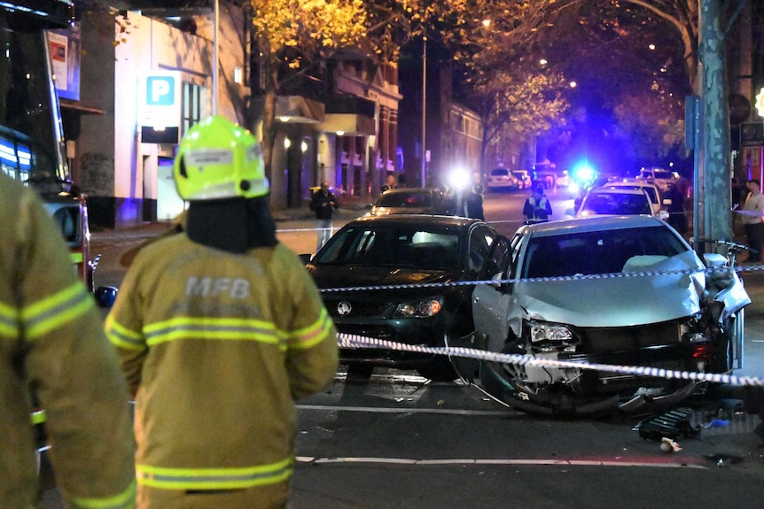 Damaged vehicles are seen at the corner of Queens Street and A'Beckett in Melbourne CBD, June 26, 2018.