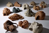 14 different ceramic objects, all different designs