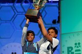 Nihar Saireddy Janga (left) and Jairam Jagadeesh Hathwar (right) hold their trophy after Scripps National Spelling Bee.