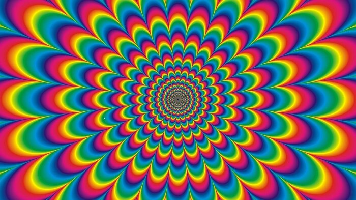 Image of rainbow colours radiating outwards to reference a psychadelic trip