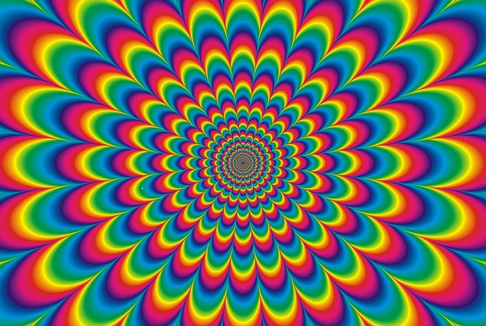 Image of rainbow colours radiating outwards to reference a psychadelic trip