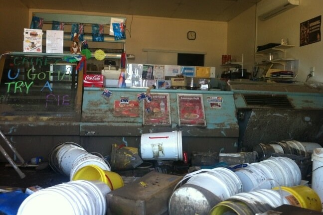 Inside a flooded North Bundaberg pie shop