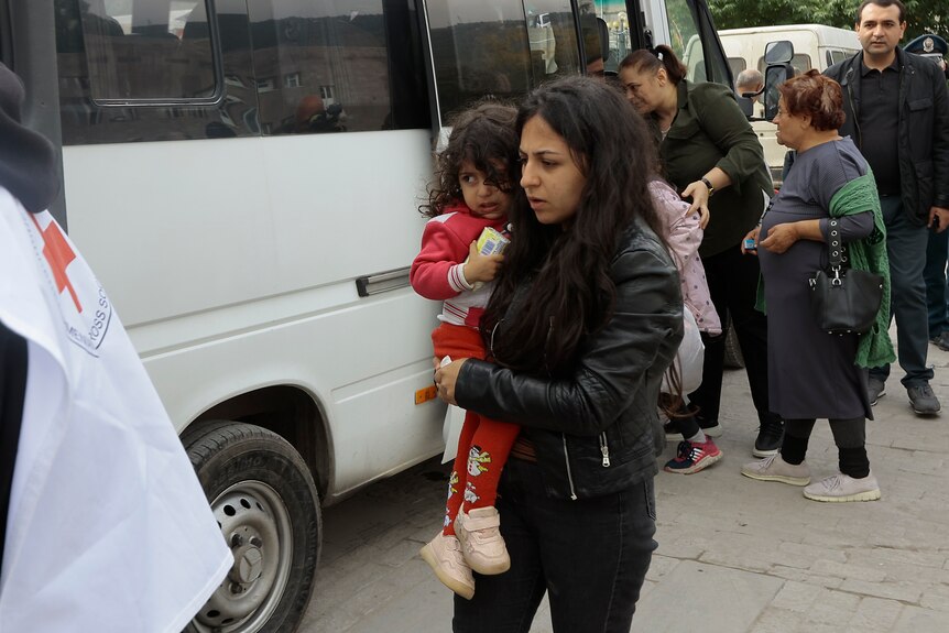 Ethnic Armenians from Nagorno-Karabakh arrive in Armenia.