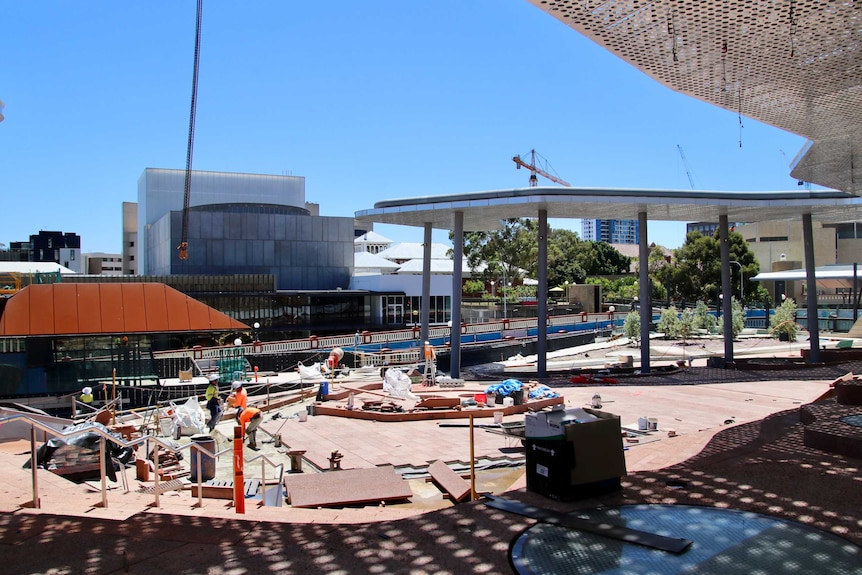 Construction workers and materials occupy the spacious Yagan Square rooftop, facing Northbridge's William Street.