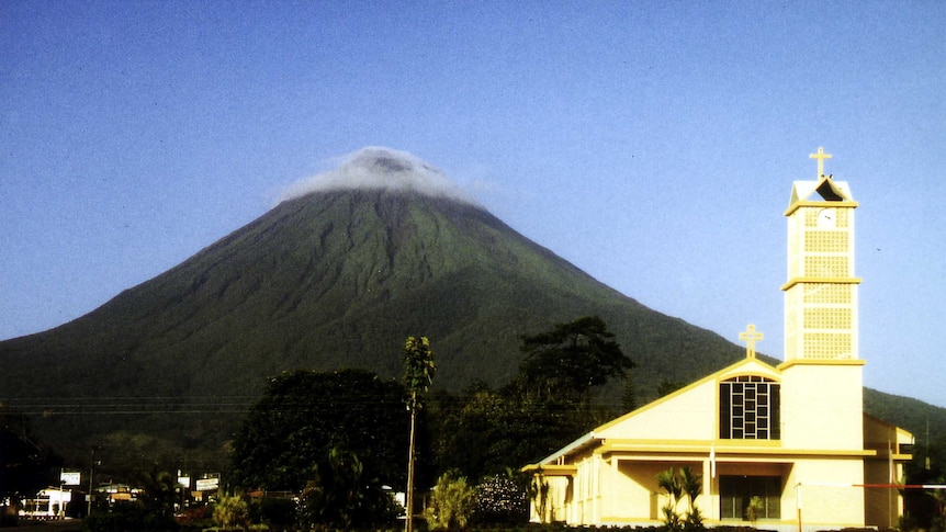 La Fortuna church with volcano in the background