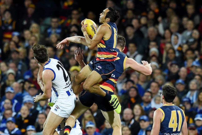 Eddie Betts takes a mark against the Kangaroos