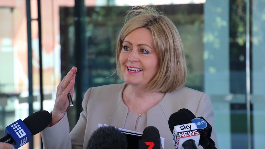 Perth Lord Mayor Lisa Scaffidi smiling at a press conference as she returns to office.