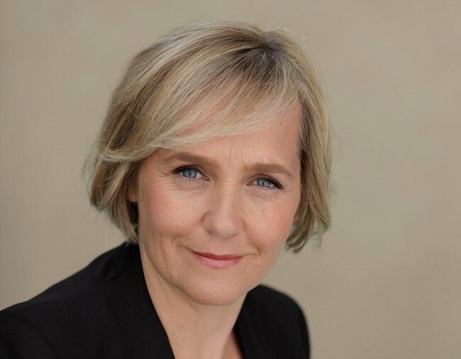 Head shot Ferguson smiling at camera.