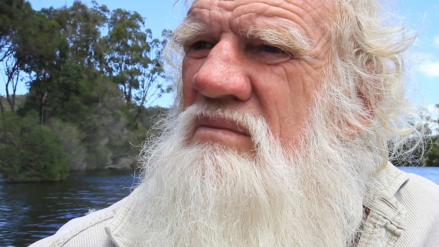 Bruce Pascoe in a small boat on the Wallagaraugh River