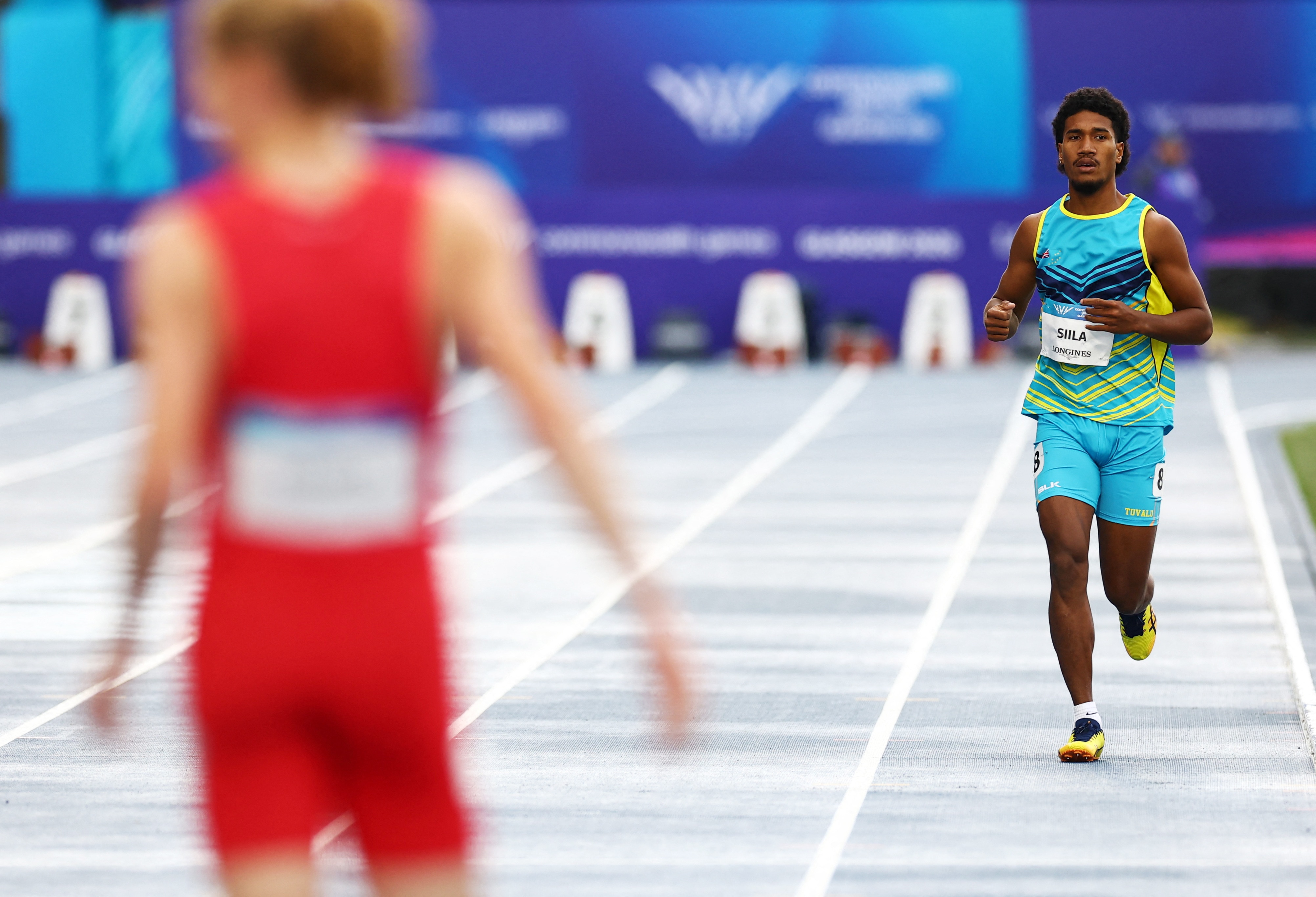 Howard Tapuaiga Siila competing in the 800m at the Glasgow Commonwealth Games.