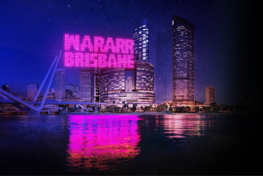 The words WARARR BRISBANE are lit up in neon lights in Southbank, Brisbane.