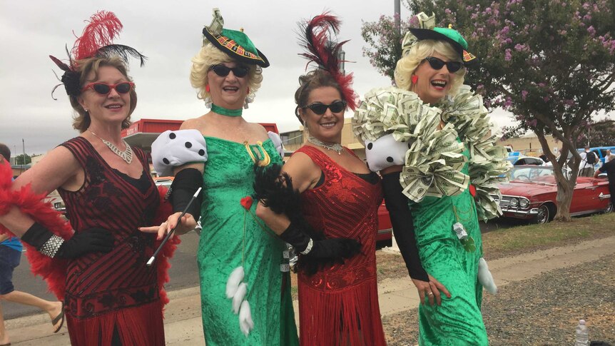 Flapper, gambling-themed dresses at Parkes Elvis Parade