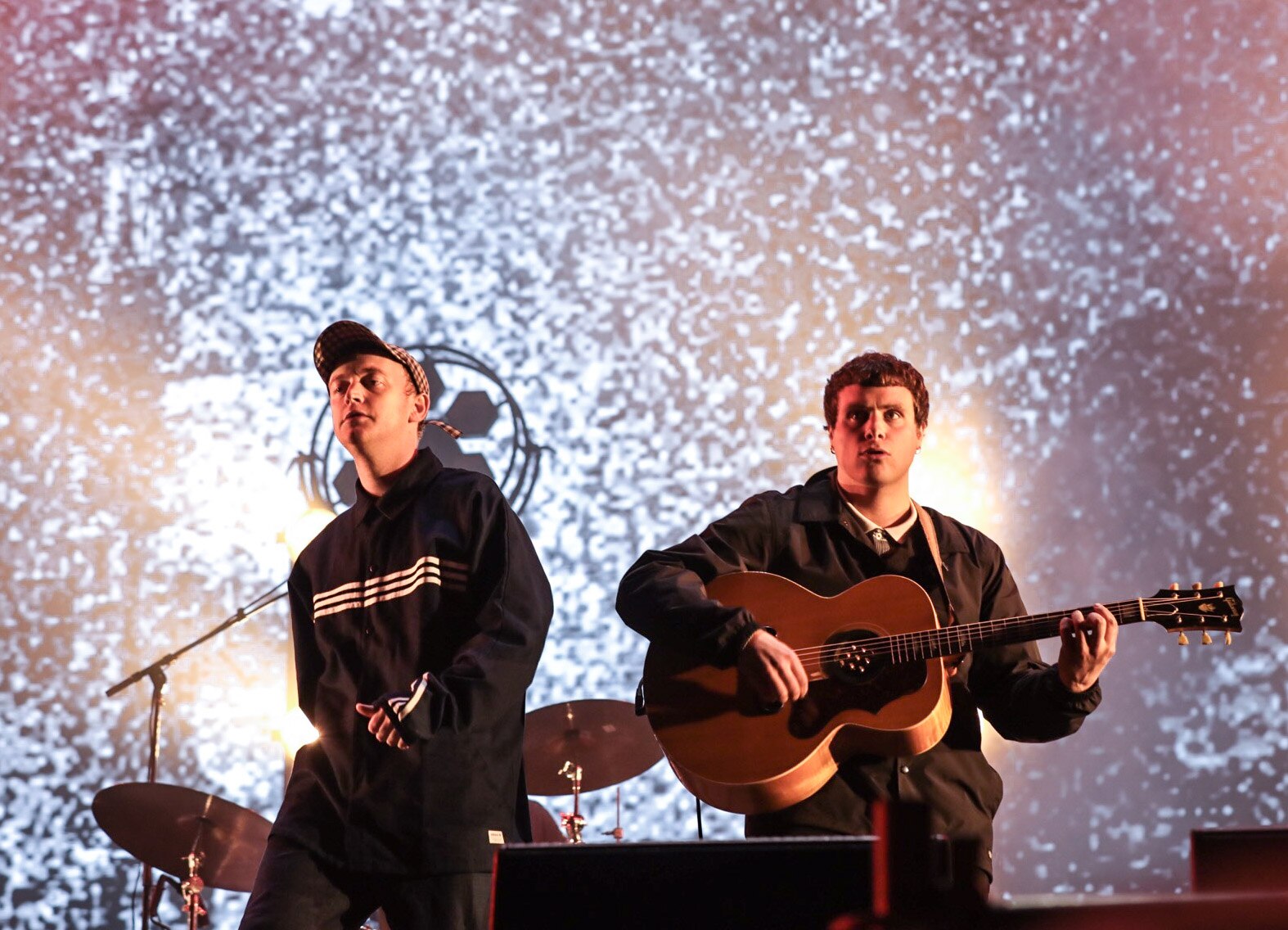 Tommy O'Dell and Johnny Took of DMA's stand on stage at Splendour In The Grass