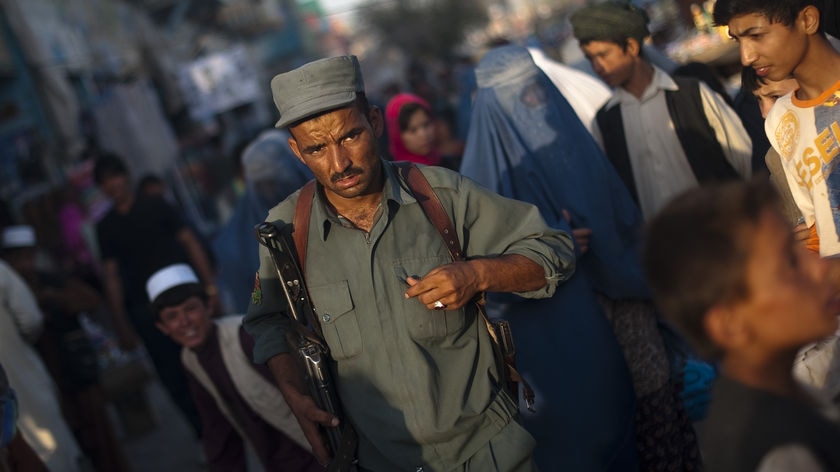 Keeping watch: a member of the Afghan National Police