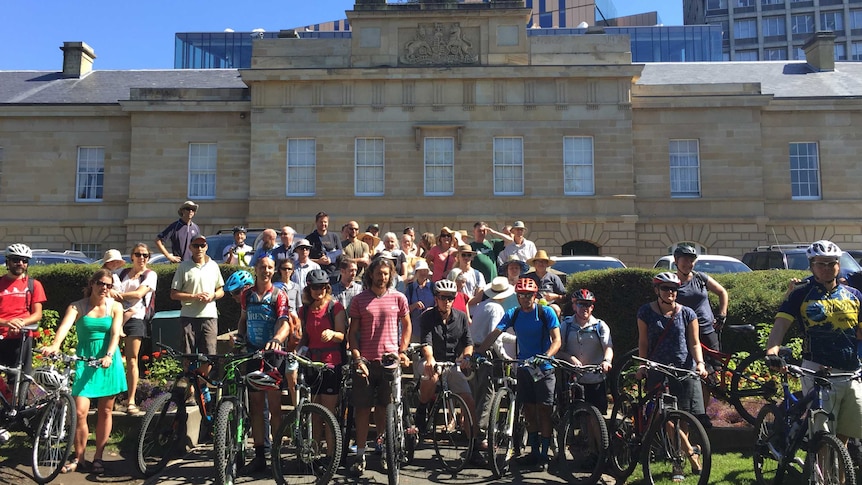 Mountain bikers protesting outside Parliament House