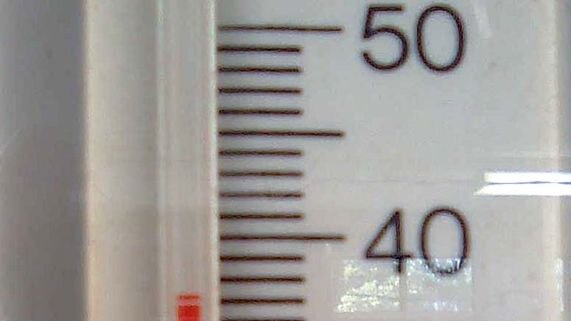 A thermometer shows the temperature to be topping 37 degrees Celsius