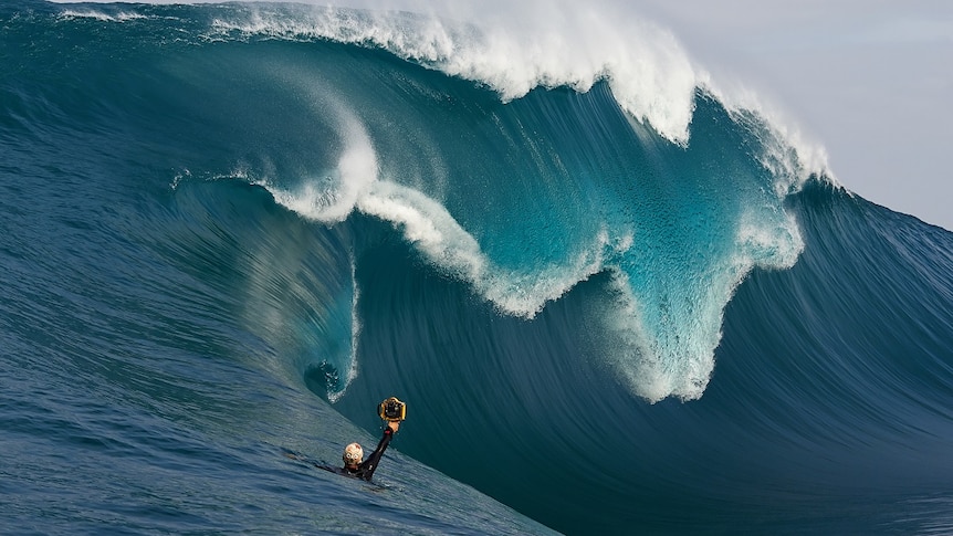 Russell Ord focusing in on a big wave