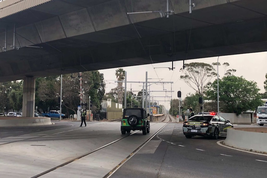 Police direct traffic at an Adelaide intersection