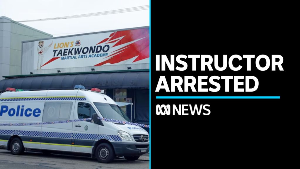 Instructor Arrested: Police van in front of Taekwondo studio