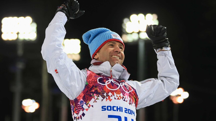 Norway's Ole Einar Bjoerndalen on the podium after winning the men's biathlon sprint at Sochi 2014.