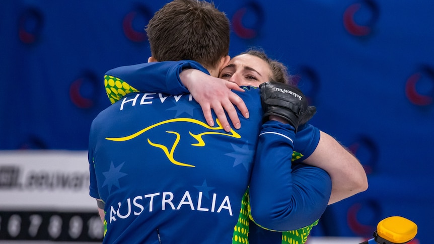 Tahli Gill hugs Dean Hewitt