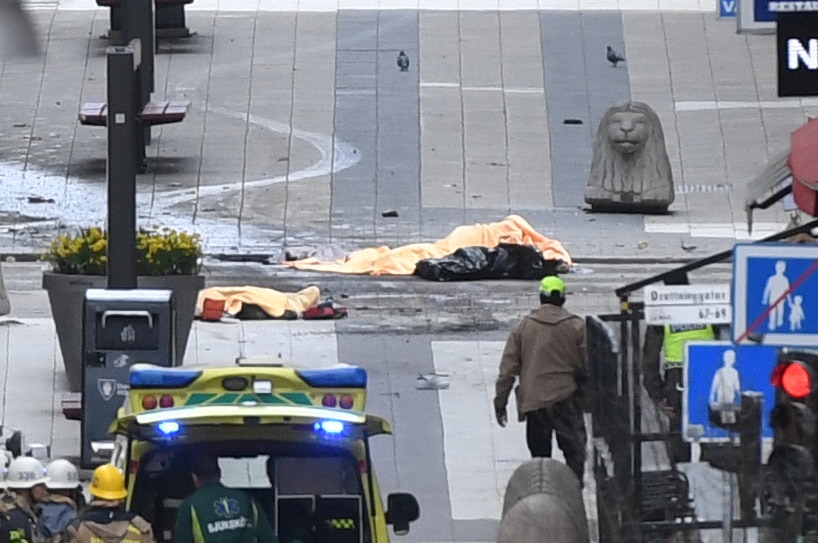 Several dead bodies are seen after a truck crashed into a department store Ahlens, in central Stockholm, Sweden.