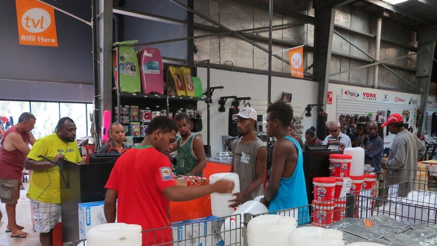 Vanuatu residents prepare for the arrival of Cyclone Pam