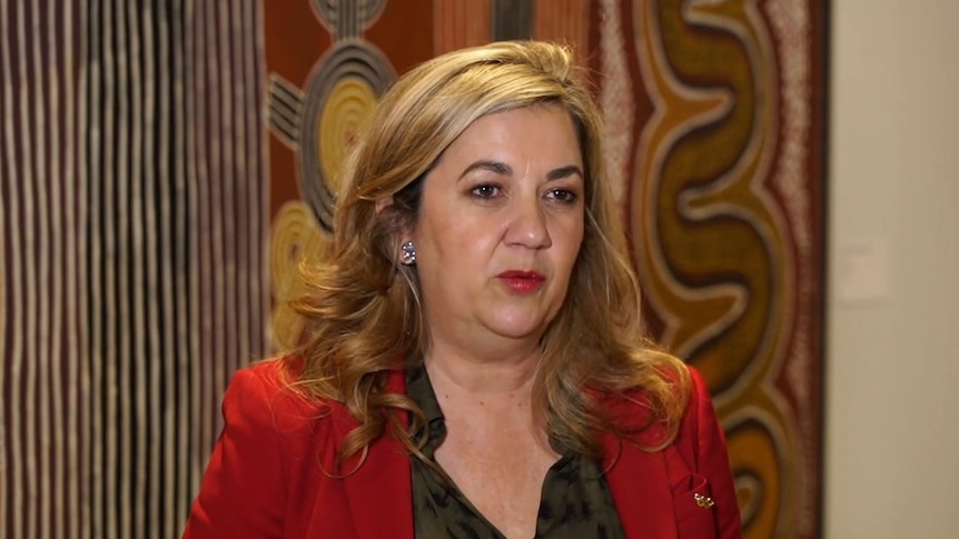 Palaszczuk in a red blazer.