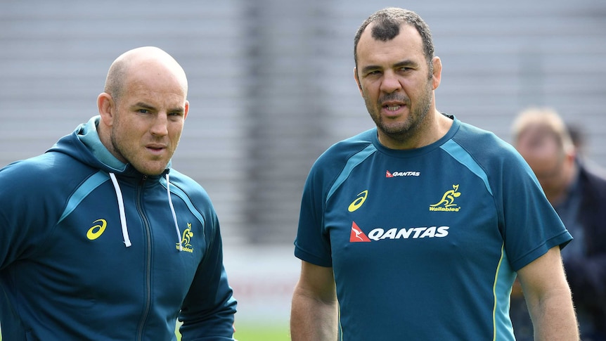 Stephen Moore (L) and coach Michael Cheika during Wallabies training at Ballymore on June 20, 2017.