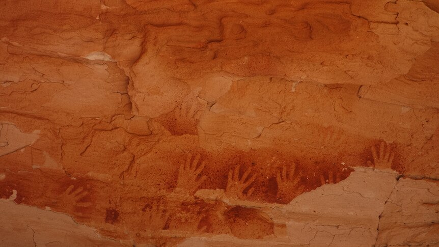 Hand stencil rock art at Wallace Rockhole NT