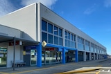 The exterior of a single-level regional airport building
