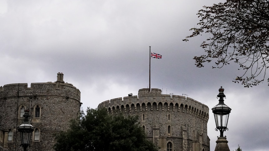 UK flag flying at the top of a building in Windsor.