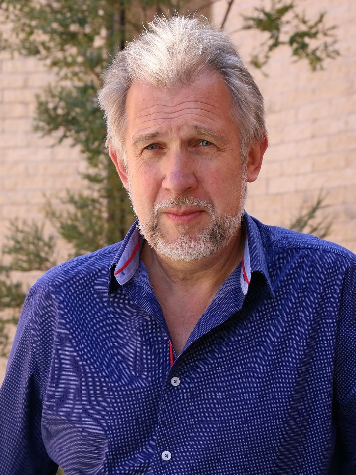 Plant biologist Sergey Shabala looks at the camera.