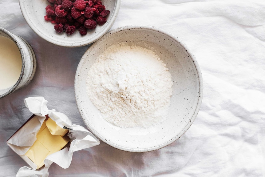 Thickened cream, frozen raspberries, butter and flour combine to make delicious white chocolate and raspberry scones.