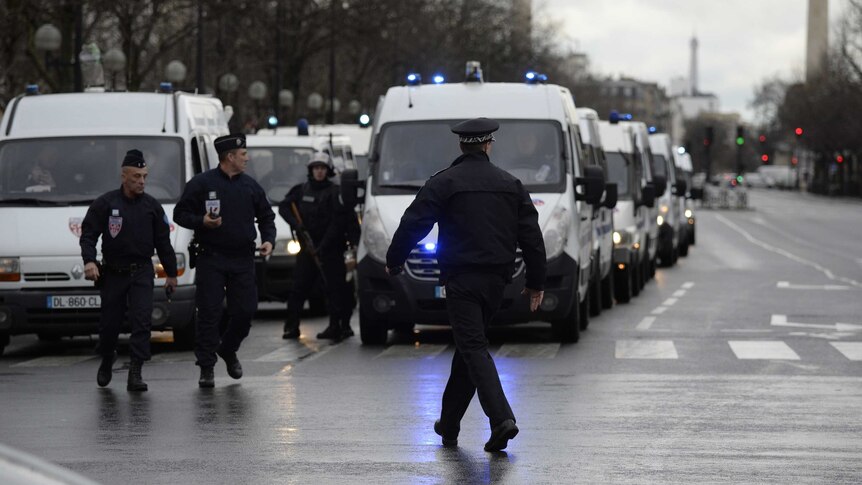 Police forces gather together in eastern Paris