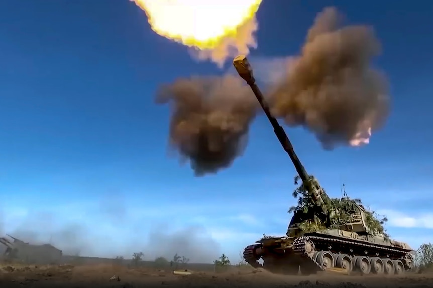 A picture of a tank firing. 