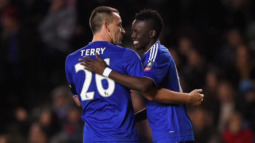 Chelsea's Bertrand Traore (R) celebrates a goal with John Terry in FA Cup tie against MK Dons.
