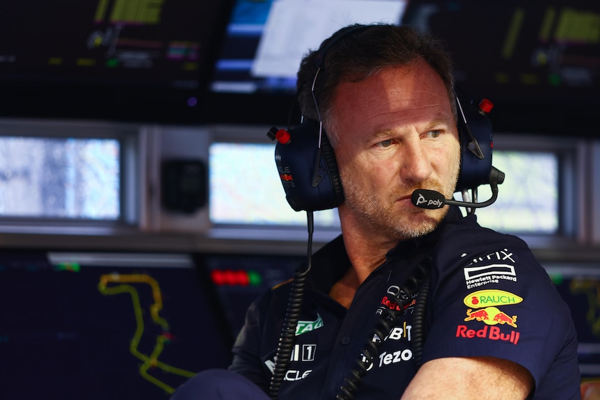 Red Bull Racing Team Principal Christian Horner looks on from the pit wall