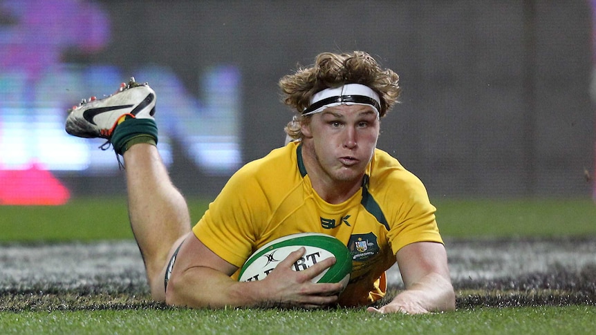 Try time ... Michael Hooper touches down for his first five-pointer