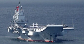 An aircraft carrier at sea.