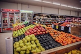 fresh fruit in aisles of a grocery shop