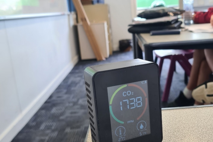 An image of a co2 monitor on a desk in a classroom