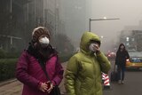 Smog over Beijing, China, people wear masks, as air pollution takes over
