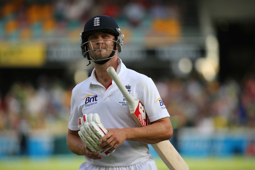 Jonathan Trott walks off on day three at the Gabba