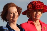 Prime Minister Julia Gillard and Quentin Bryce, Governor General await the arrival of Queen Elizabeth II.