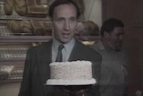 Paul Keating with a birthday cake