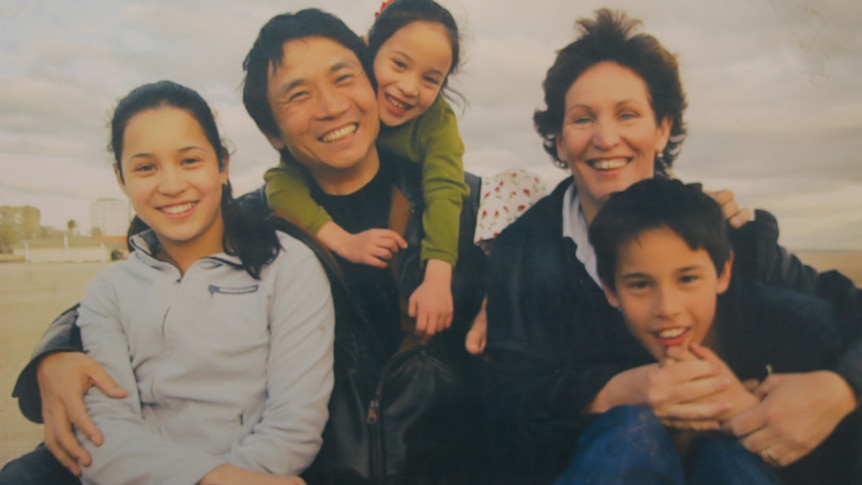 Li Cunxin with his wife Mary and three children