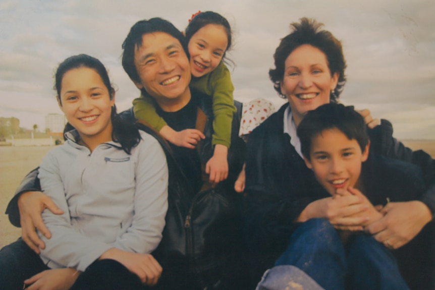 Li Cunxin with his wife Mary and three children