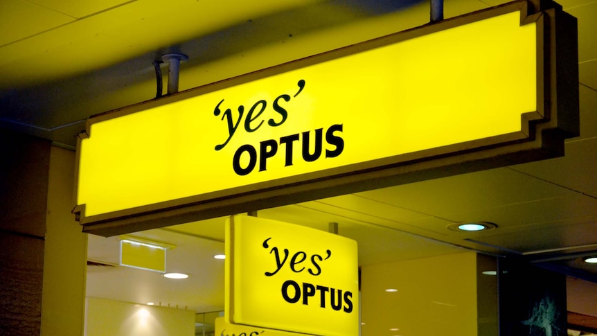 Optus signs outside a shop in Brisbane